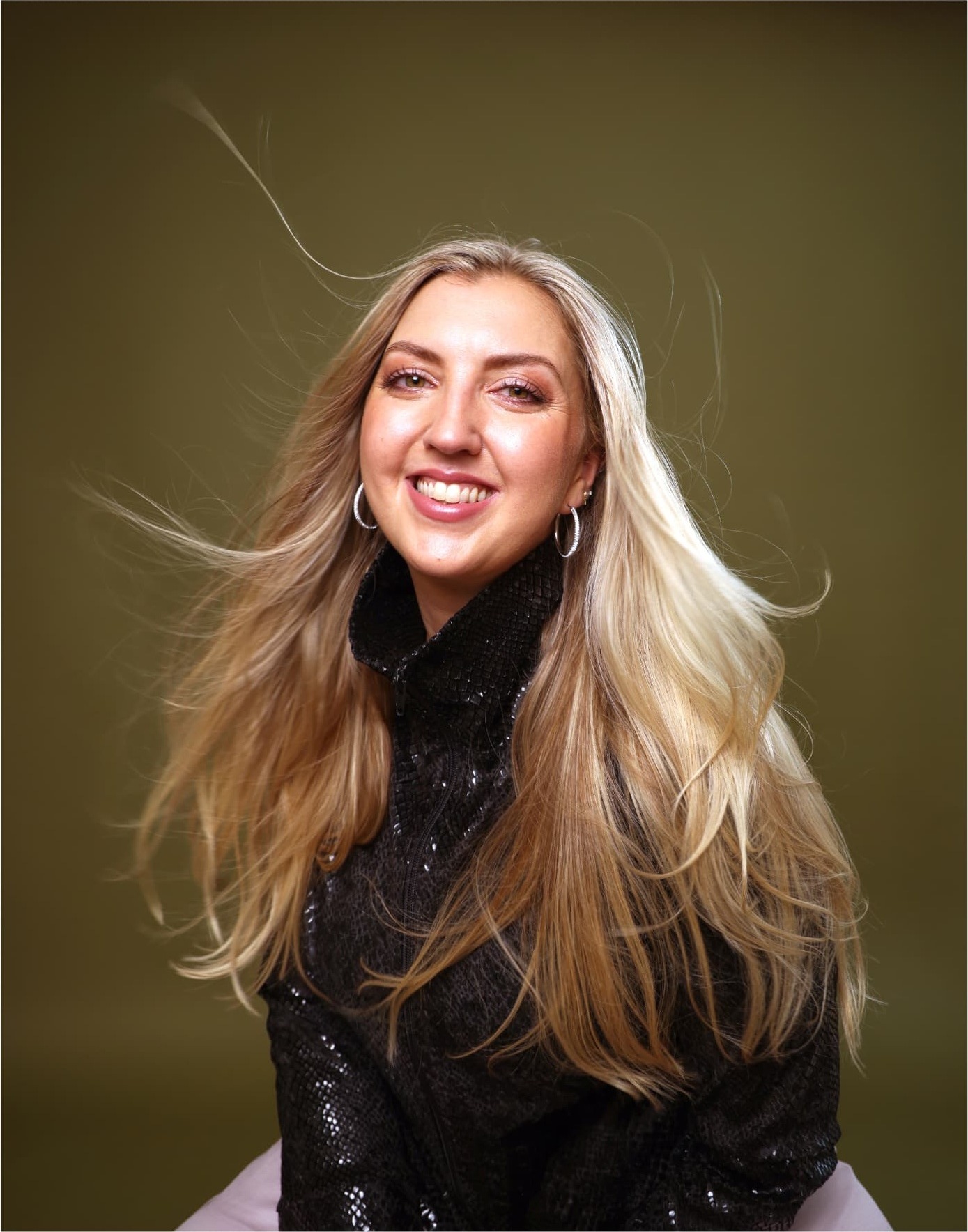 Charl Oaten in a black sequinned jacket